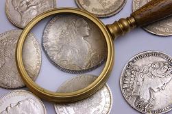 Use a Magnifying Glass to Grade Coins